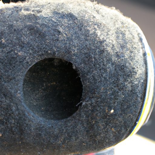 how do you clean carbon buildup on leaf blower muffler